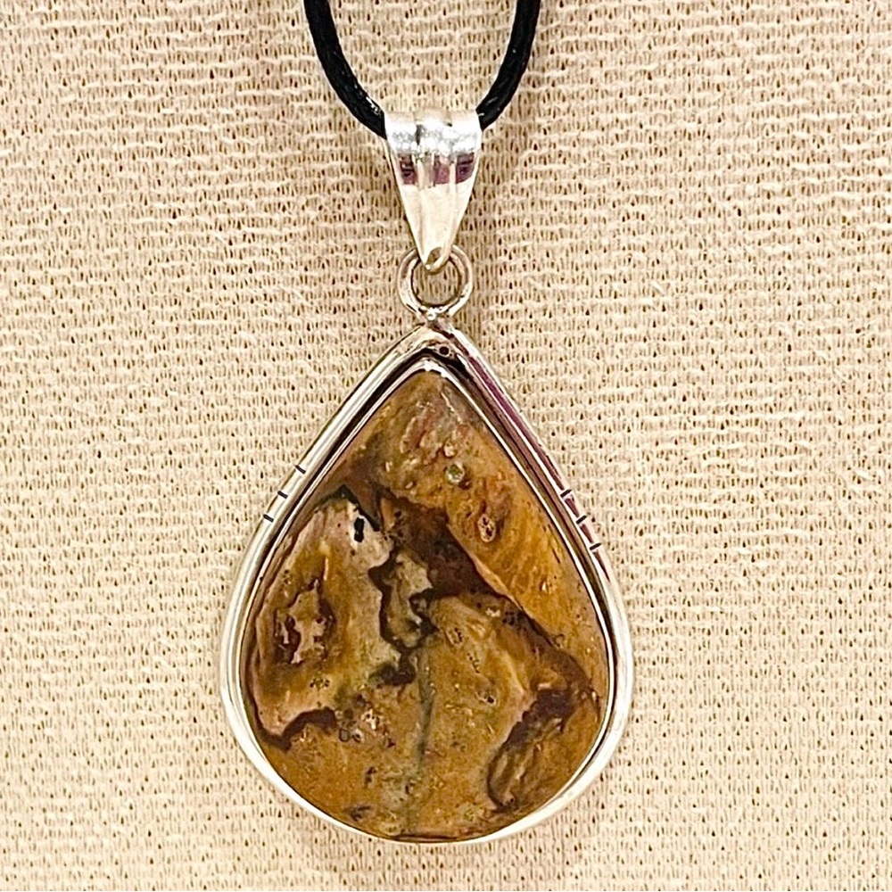 Navajo Artisan Sterling Set Natural Rainforest Rhyolite Teardrop Pendant.